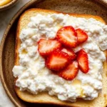 The Best Dairy Free Cottage Cheese Recipe — Fool Everyone at First Bite 2 Dairy free cottage cheese on toast topped with fresh strawberries